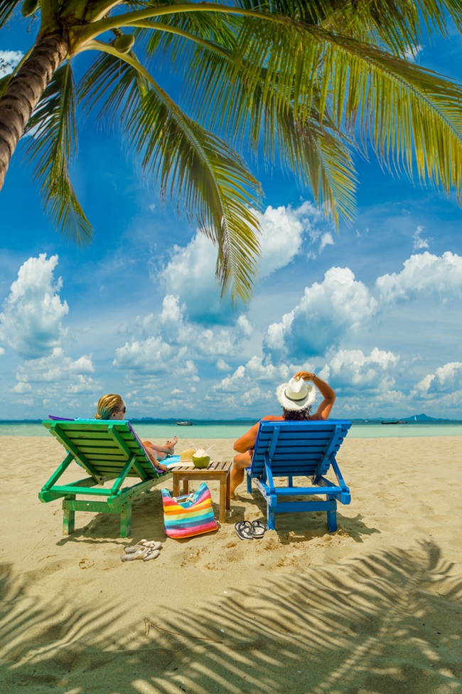 couple sitting and relaxing tropical the beach